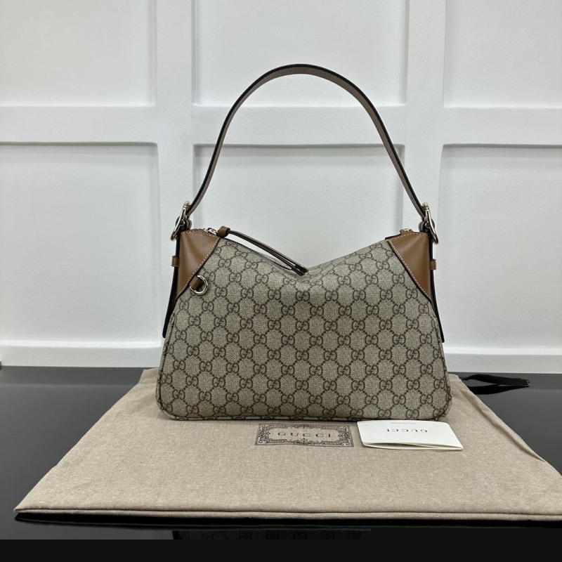 G*u*i top handle bags